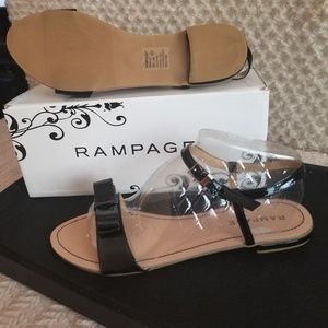 Black Patent Leather Sandal With Front Bow. New